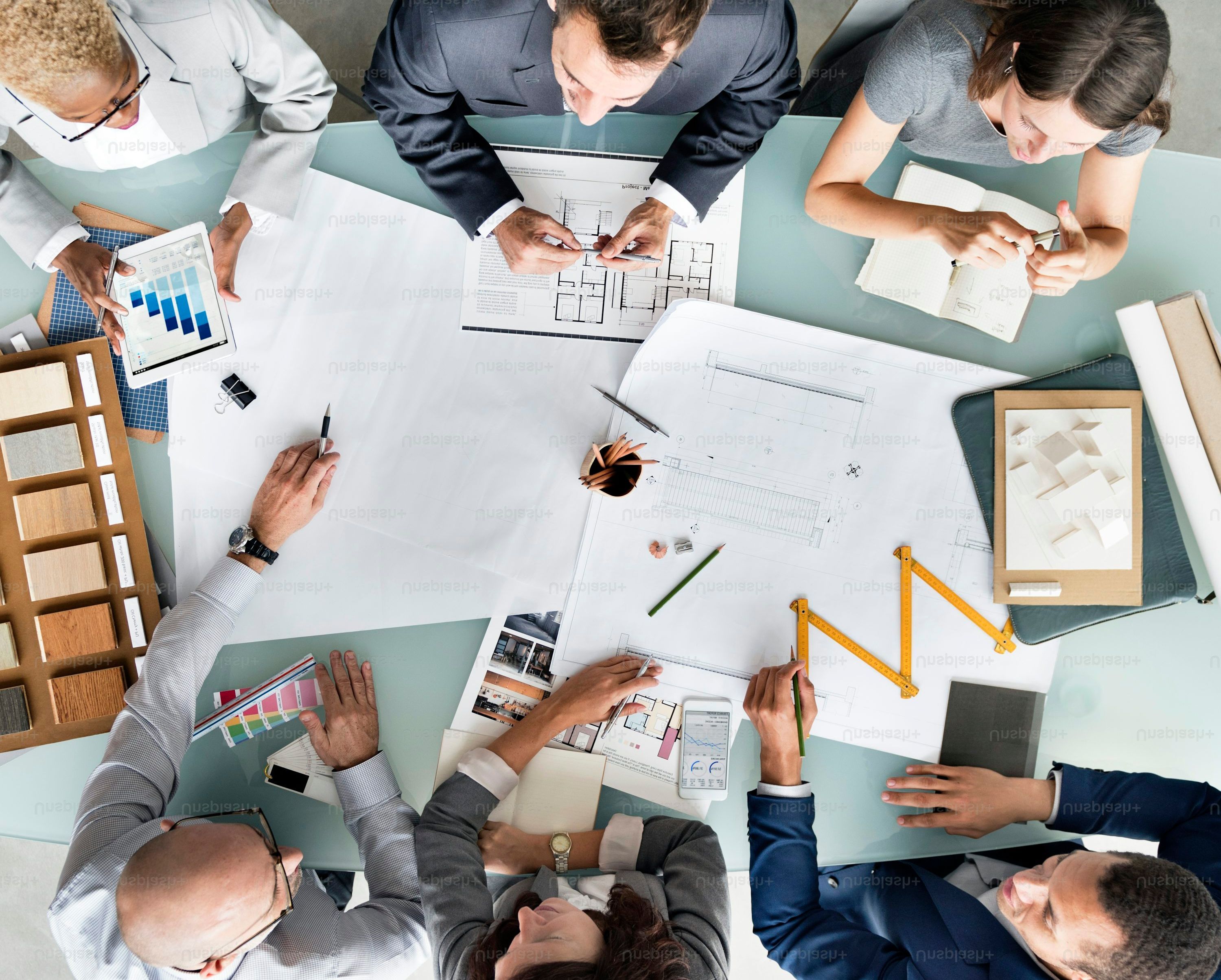 Two female team members discussing project
